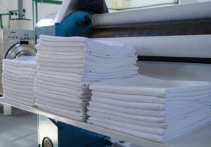 Laundry services with clean cloths well folded.